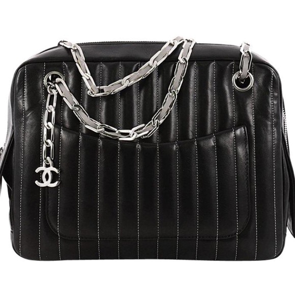 CHANEL Handbags - CHANEL Quilted Vertical Mademoiselle Camera Case